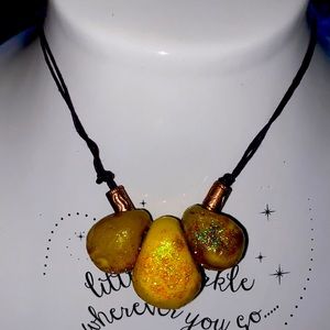 Handmade pendant two strand in purple.